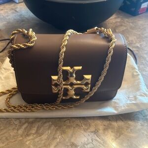 Tory Burch Eleanor handbag. Never used view in 2nd pic the rubbing on the edge